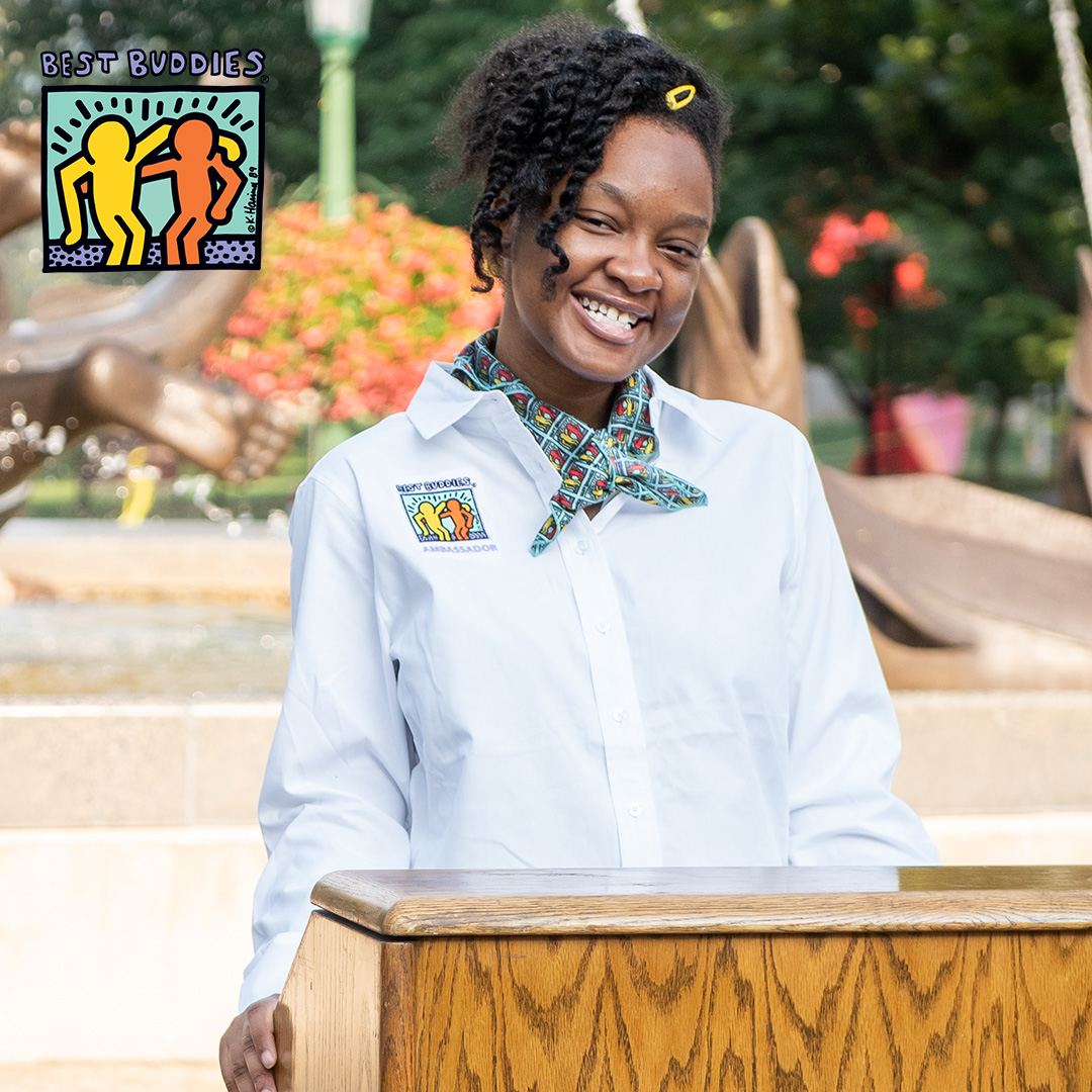 Female Buddy Ambassador at podium