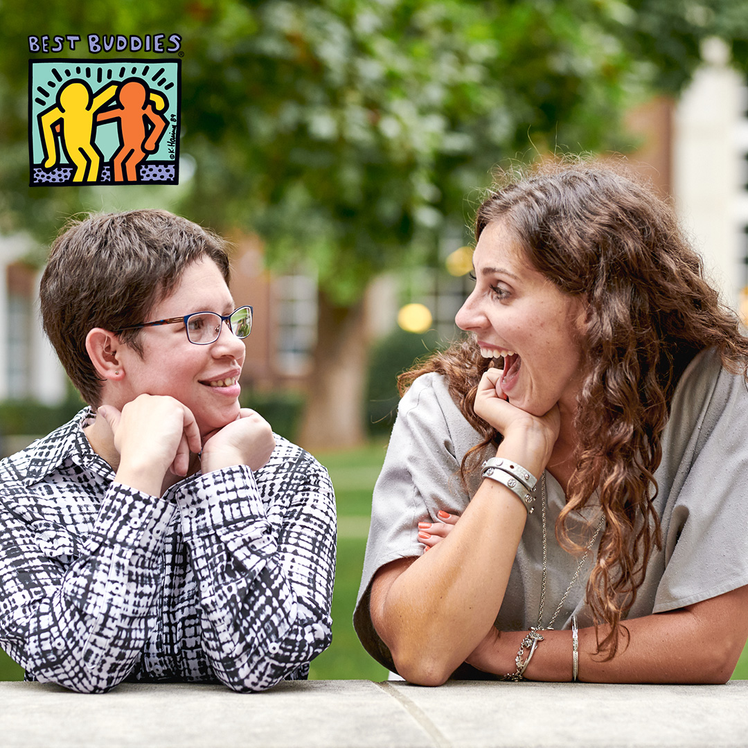 Female Buddy Pair in conversation and laughing