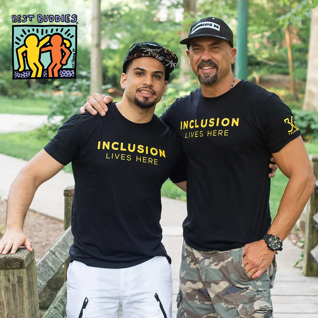 two male Citizen program members with their arms over each others shoulders