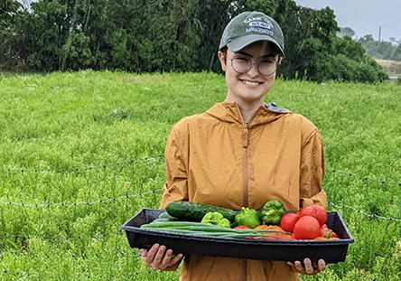 Best Buddies Transitions program member at work on a farm